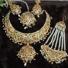 24k gold plated handmade jadau multi color adorable set for women to enhance the look. To Steal the spotlights at party. Festive Multicolor Hand Set Sets, Festive Multicolor Hand Set, Handmade Gold Kundan Set, Handmade Gold Kundan Jewelry Set, Handmade Kundan Gold Jewelry Set, Handmade Kundan Gold Sets, Multicolor Gold Plated Kundan Necklace Gift, Multicolor Gold-plated Kundan Necklace Gift, Multicolor Gold-plated Jewelry Sets For Gifts