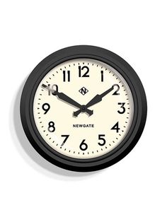 a black and white clock with numbers on the face is shown against a white background