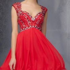 Mori Lee Short Red Dress With Beaded And Jeweled Bodice: -Worn Once -Like New Condition -Dry Cleaned Red Homecoming Dress With Sweetheart Neckline, Red Sweetheart Neckline Dress For Homecoming, Glamorous Red Dress For Homecoming, Elegant Embellished Red Mini Dress, Red Embellished Homecoming Dress, Elegant Red Embellished Mini Dress, Red Embellished V-neck Evening Dress, Dress With Jewels, Short Red Dress