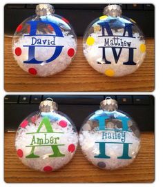 three personalized christmas ornament ornaments on a table