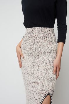 Midi skirt in cotton boucle open knit with whipstitch edge. Wear the Dimitra back to our Todd Top for a coordinated look. - Wide ribbed waistband- Front left side slit - Whipstitch edge along hem - Midi length Fabric Notes 100% Cotton Dry CleanMade in Peru Model is 5’10 wears size S FINAL SALE. Jumpsuit Jacket, Skirt Socks, Open Knit, Signature Collection, Tee Dress, Sweater Blouse, Skirt Pants, Midi Length, Sustainable Fashion