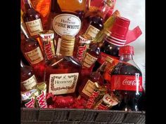 a basket filled with lots of different types of liquor