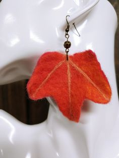 Maple Tree Leaf felted Earrings decorated with a metal brown bead and hang approximately 3 1/2 inches (9 cm) long from the top of the ear wire.  These one of a kind earrings are perfect as an accent to your fall season outfit.  The earrings are large but lightweight and very comfortable to wear all day long.  The felted leaves created by: Olga Romanenko - felted jewelry and items designer, polymer clay jewelry designer, photographer, member of the shop The earrings created by: Marichka - artist, Felted Earrings, Maple Tree, Felt Jewelry, Support Handmade, Beaded Dangles, Fall Season, Leaf Earrings, Polymer Clay Jewelry, Clay Jewelry