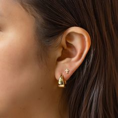 These statement small hoops feature a unique teardrop silhouette, adding a feminine twist to a bold look. Elevate your style and make a statement with these luxurious gold vermeil hoop earrings. Gold Vermeil Inside Diameter 0.5in(13mm), Width 0.3in(8mm) Click closure E190-13G Yellow Gold Teardrop Hoop Earrings For Everyday, Everyday Yellow Gold Teardrop Hoop Earrings, Everyday Teardrop Huggie Earrings With Polished Finish, Gold Teardrop Hoop Earrings Tarnish Resistant, Gold-tone Tarnish Resistant Teardrop Hoop Earrings, Everyday Yellow Gold Teardrop Huggie Earrings, Tarnish Resistant Teardrop Huggie Earrings, Gold Plated Teardrop Huggie Earrings, Gold Teardrop Huggie Earrings For Everyday