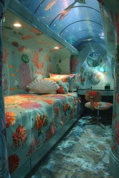 an underwater themed bedroom with fish and corals on the walls, along with colorful bedding