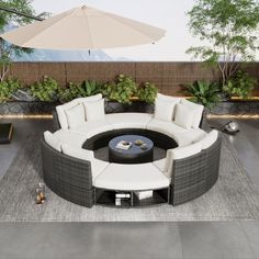 an outdoor seating area with umbrellas and potted plants