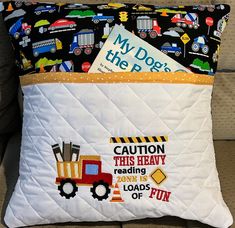 a pillow that has some kind of construction theme on it