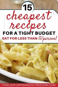 a white bowl filled with pasta on top of a wooden table