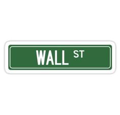 a green street sign that says wall st