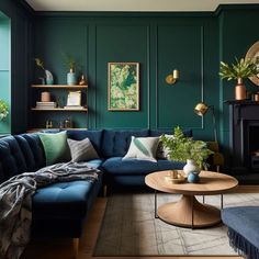 a living room with green walls and blue couches in front of a fire place