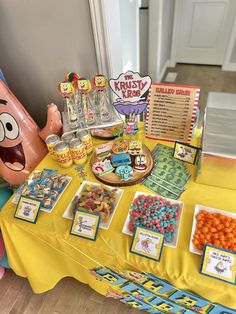 an assortment of candy and candies on a table