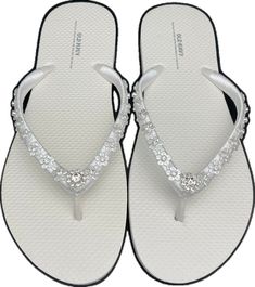 Elegant Silver Beach Flip Flops, Elegant Adjustable Flip Flops For Summer, Silver Rhinestone Flip Flops, Silver Rhinestone Open Toe Flip Flops, Silver Open Toe Flip Flops With Rhinestones, White Sandals With Rhinestones And Adjustable Fit, Elegant White Toe Post Flip Flops, Elegant Silver Flip Flops For Summer, Elegant Adjustable Flip Flops For Beach