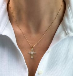 Womens Cross necklace, gold filled cross necklace, gold cross necklace, dainty jewelry, gifts for her, religious necklace, birthday gift Gold filled cross necklace  D E T A I L S: *1"  Gold filled cross pendant with Cubic Zirconia Stones *Gold filled Satellite or Cable chain- choose your perfect length at checkout  *Model wearing 18" length  Water & tarnish resistant!  Gold filled jewelry is durable & tarnish resistant.  Gold filled quality products are suitable for daily wear and is also water Everyday 14k Gold Filled Cross Pendant Necklace, 14k Gold-filled Gold Cross Pendant Necklace, Gold Cross Pendant Necklace In 14k Gold Filled, 14k Gold Filled Cross Pendant Necklace, 14k Gold Filled Gold Cross Necklace, Gold Cross Charm Necklaces In 14k Gold Filled, Gold Cross Necklace In 14k Gold Filled, 14k Gold Filled Cross Necklace With Delicate Chain, Dainty 14k Gold-filled Cross Necklace