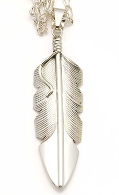 Sterling silver intricately created feather pendant by well known Navajo artist Chris Charley. This pendant is accompanied by a unique 24"" handcrafted double link silver chain by Navajo artist Sally Shirley. Pendant is 3 1/2"" long, 7/8"" wide and weighs 25 grams +- with the chain. Silver Feather Pendant Jewelry, Feather Pendant, Silver Feather, The Chain, Jewelry Art, Silver Chain, Sterling Silver, Chain, Pendant