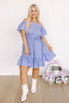 Plus Size - You are sure to look simply supreme in this stunning sky blue dress featuring lightweight breezy material patterned with white accent stripes, a straight elastic neckline with short sleeves that can be worn on or off the shoulder, a tie belt waistline, and a flattering silhouette that falls into a peplum bottom with an uneven knee-length hemline! Measurements 1XL : Bust 36", Hip 40", Length 34", Sleeve Length 7.5", Waist 28-32". 2XL : Bust 38", Hip 42", Length 34.5", Sleeve Length 8" Blue Off Shoulder Dress For Summer Day Out, Blue Off-shoulder Dress For Summer Day Out, Blue Off-shoulder Dress For A Summer Day Out, Casual Blue Off-shoulder Dress For Day Out, Blue Off-shoulder Casual Dress For Vacation, Casual Blue Off Shoulder Dress For Spring, Blue Short Sleeve Off Shoulder Summer Dress, Blue Off Shoulder Short Sleeve Dress For Summer, Blue Off Shoulder Dress With Short Sleeves For Summer