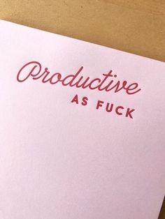 a pink piece of paper with the words produtive as fock on it