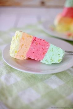 two pieces of cake sitting on top of a white plate