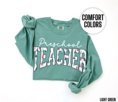 You will love our Comfort Colors Preschool teacher long sleeve Christmas t shirt. It says, Preschool teacher in a Christmas tree pattern font. This long sleeve Christmas preschool teacher tee would make a great teacher gift or a gift for yourself. It comes in 4 beautiful Comfort Colors brand t shirt colors, blue spruce, light green, crimson and true navy. ~PRODUCT DETAILS~ -100% ring-spun cotton -Medium fabric (6.1 oz/yd² (206.8 g/m -Classic Fit -Sewn-in twill label T shirt Care instructions: Ma Teacher Christmas Tree, Colors Preschool, T Shirt Colors, Elementary Teacher Gifts, Third Grade Teacher Shirts, 3rd Grade Teacher, Christmas Preschool, Third Grade Teacher, Xmas Tees