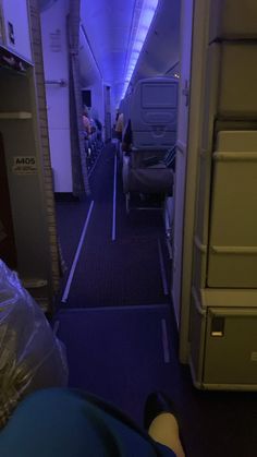 the inside of an airplane with people on it