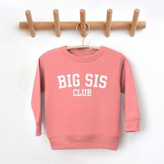 Looking for a cute sweatshirt for your kids? We have the perfect Big Sis Club graphic sweatshirt addition to their closet! Also available in youth sweatshirts. School Crew Neck Sweatshirt With Name Print, Pink Graphic Print Sweatshirt For School, Cute Letter Print Sweatshirt For School, Long Sleeve Sweatshirt With Text Print For School, Cotton Letter Print Sweatshirt, Crew Neck Sweatshirt With Screen Print For School, Long Sleeve Sweatshirt With Screen Print For School, Heart Of Gold Quotes, Big Sis