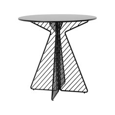 a black table with a white top and wire design on the bottom, against a white background