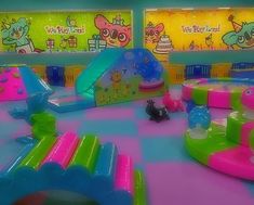 an indoor play area with toys for children