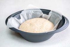 a loaf of bread sitting in a bowl