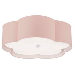 a white ceiling light with a pink shade on the bottom and an oval shape around it