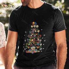 an image of a christmas tree with all the characters on it's side shirt