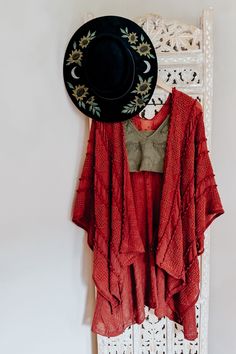 The Zoya Zig Zag Embroidered Kimono is the perfect layering piece for any outfit. Whether you later it over a graphic tee or a pretty little cami tank it’s sure to heighten the style factor of any outfit you pair it with. 100% Acrylic One size fits sizes S - 3XL Measures 45” x 31” Traci (that’s me with the crazy color hair!) Measurements: 5’ 3”, Bust 50", Waist 48", Hips 52" Typically wears a size 2XL & a size 20W. One Size Festival Tops For Fall, Bohemian Crew Neck Top For Layering, Bohemian Cotton Tops For Fall, Bohemian Cotton Tops For Festivals, Fall Bohemian Cotton Tops, Bohemian One Size Top For Fall, One Size Bohemian Top For Fall, Bohemian Top For Fall, Free-spirited Festival Tops For Fall