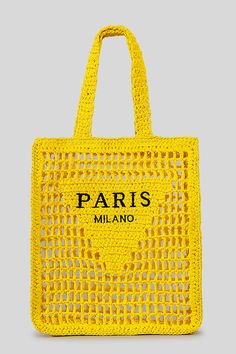 a yellow bag with the words paris on it