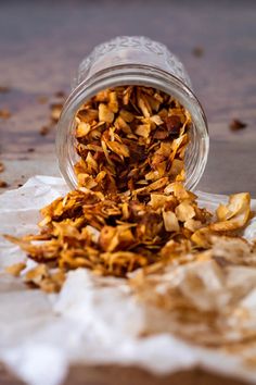 a glass jar filled with chopped up food