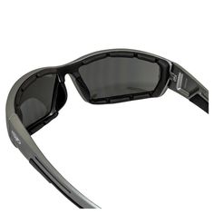 Experience the new standard in quality riding sunglasses with this classic, high-performance pair of sport and motorcycle shades that ticks off all the boxes on your list and then some. Featuring metallic grey frames and smoke lenses, Global Vision's Sly motorcycle riding and safety sports sunglasses feature a unique aerodynamic design that ensures a universal fit no matter the shape and size of your facial features. Built on the foundation of a high-quality frame co-injected with rubber nose pa Protective Sports Sunglasses With Polarized Lenses, Protective Outdoor Sunglasses With Uva Protection, Protective Outdoor Sunglasses With Tinted Lenses, Protective Tinted Sunglasses For Outdoor, Protective Sports Sunglasses With Tinted Lenses, Gray Anti-reflective Sunglasses For Outdoor, Gray Sunglasses With Uva Protection For Outdoor, Gray Sunglasses With Uv Protection For Outdoor, Protective Polycarbonate Sunglasses With Tinted Lenses