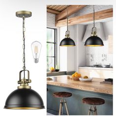 two pendant lights hanging from the ceiling in a kitchen