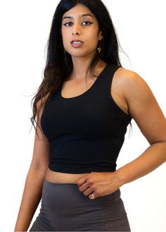 "Women's Hemp and Cotton Crop Top Tank Our brand new crop top tank top! Just in time for summer. Perfect for working out, yoga, lounging, wearing with shorts, and super cute with a pair of jeans. Fabric: 52% Hemp 43% Fleece Cotton Blend 5% Spandex Color: Black, White, Tie Dye Blue Green, or Gray Please note: Every Tie Dye top is individually hand dyed so no two crop tanks are exactly the same. Each is almost a special work of our art. We are honored to be able to offer a one of a kind eco-friend Athleisure Tops With Built-in Bra For Relaxation, Black High-stretch Yoga Tank Top, Black High Stretch Tank Top For Yoga, High Stretch Black Tank Top For Yoga, Black Tank Crop Top With Built-in Bra, Black Tank Top For Light Exercise, Black Bra-friendly Tank Top For Light Exercise, Sleeveless Gym Crop Top With Built-in Bra, Black Racerback Crop Top For Pilates