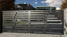 a large metal gate in front of a building