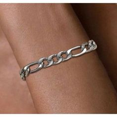 Brand New Women's White Gold Figaro Chain Bracelet 7" Length (Most Common Women's Size - 8" Is Also Available If You Have A Slightly Larger Wrist) Width 8mm Genuine 18k White Gold Plated Sterling Silver Retail Price $350 Buy With Confidence From A Trusted Seller With A 99%+ Feedback Rating! A0179 (Id-413) Trendy Silver Jewelry With Figaro Chain, Cuban Link Bracelet With Adjustable Chain, Everyday Metal Figaro Chain Bracelets, Chunky Cuban Link Chain Bracelet, Silver Metal Jewelry With Figaro Chain, Modern Silver Bracelet With Figaro Chain, Elegant Silver Bracelet With Figaro Chain, Silver Bracelets With Curb Chain, Silver Cuban Link Bracelet With Figaro Chain As Gift