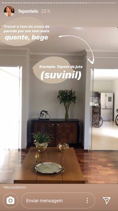 a living room filled with furniture and a wooden table