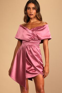 Lulus Exclusive! The party seems to follow the Lulus Always Celebrating Mauve Pink Satin Off-the-Shoulder Mini Dress! Sleek woven satin sweeps across an off-the-shoulder neckline (with hidden no-slip strips), a surplice bodice, and short sleeves. Gathered high waist sits above a mini skirt with an asymmetrical overlapping panel. Hidden back zipper/clasp. Fit: This garment fits true to size. Length: Mid-thigh. Size small measures 36" from top to bottom. Bust: Works best for A to C cup sizes. Wais Mini Dress Satin, Off The Shoulder Mini Dress, Vibrant Dress, Short Bridesmaid Dresses, Mauve Pink, Dress Satin, Asymmetrical Skirt, Lulu Dresses, Green Satin