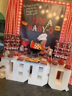 a baby shower party with food and decorations