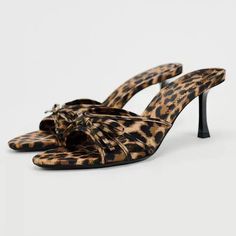 Step out in style with these trendy leopard print high heel slippers. Featuring a chic bow knot detail, these mules add a touch of glamour to any outfit. Perfect for lounging or a night out- Golden Atelier Mini Heels, Leopard Kitten, Nyc Closet, Leopard High Heels, Leopard Print High Heels, Luxury Heels, Little Miss Perfect, Leopard Print Bow, Extra Outfits