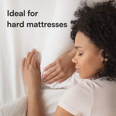 a woman laying in bed with her hand on the pillow and text that reads ideal for hard mattresses