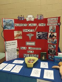 a table with signs and pictures on it that read nurses call the shots be a lifesaver be a nurse