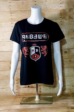 RBD , Rebelde Logo ,Band Pop Music , Black T-shirt For Women (DTP) 100 % cotton Gildan.... Black.... Brand new Rebellious Streetwear T-shirt With Crew Neck, Rebellious Crew Neck T-shirt For Streetwear, Rebellious Cotton T-shirt With Graphic Print, Rebellious Black Crew Neck T-shirt, Black Cotton Rocker T-shirt, Music Black, T Shirt For Women, May 31, Pop Music