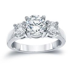 three stone diamond engagement ring in 18k white gold with 0 25 carat round brilliant cut diamonds