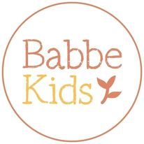 the logo for babble kids is shown in an orange circle on a white background