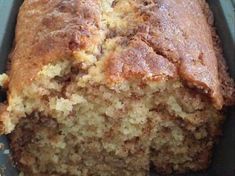 a loaf of banana bread sitting in a pan