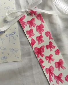 a piece of paper that has been made to look like a tie with red leaves on it