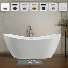 a white bath tub sitting on top of a hard wood floor next to a wall