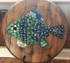 a wooden table topped with lots of beer bottle caps